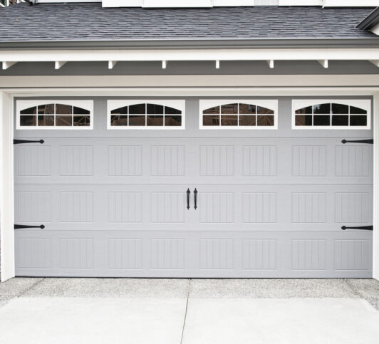 A grey garage door installed by a garage door company in Davenport IA